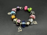 Sterling Silver Fully Loaded Bracelet 8” with 21 Charms 50Gs