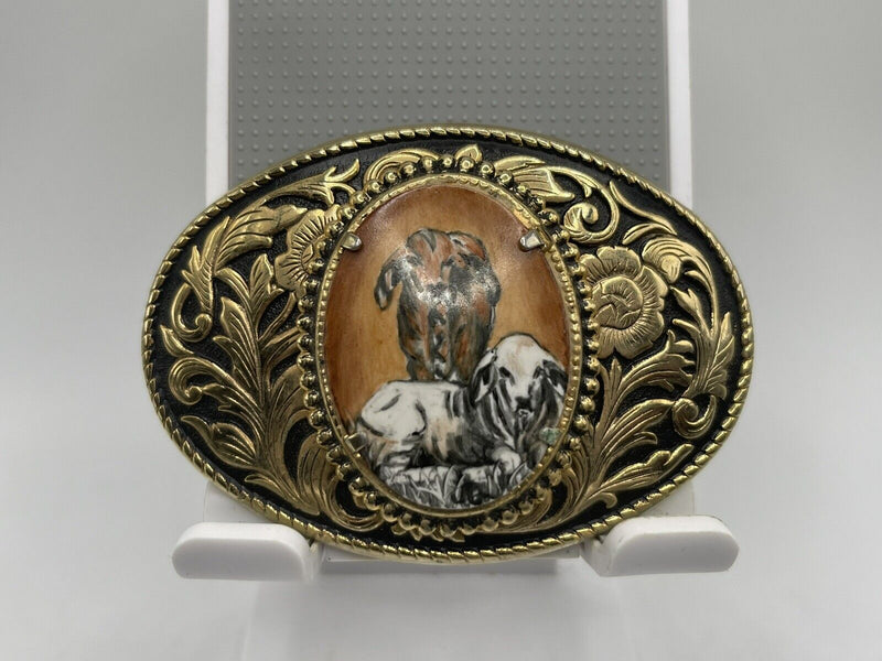 Vintage Deer Belt Buckle on Floral Background